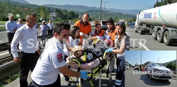 SAPANCA TEM OTOYOLU UZUNKUM MEVKİİNDE OTOMOBİLİN ÇARPTIĞI AYŞE ACAR YARALANDI